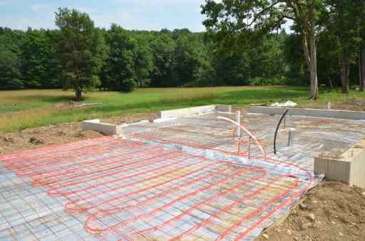 Insulation goes under the radient piping